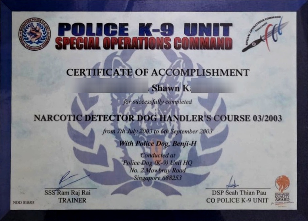 Singapore Police K-9 Unit Special Operations Command Certificate of Accomplishment 2003 — Narcotic Detector Dog Handler's Course (Course 03/2003) completed by Shawn K with Police Dog Benji-H, signed by SSS Ram Raj Rai and DSP Seah Thian Pau